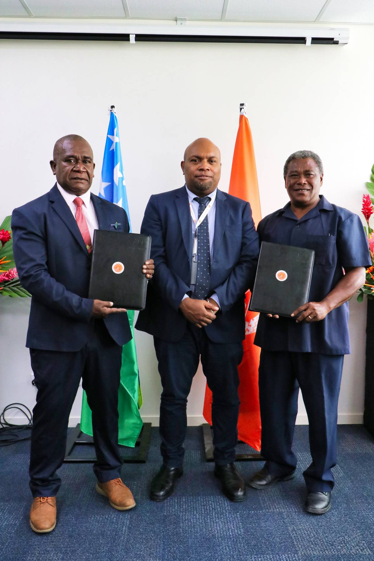 L-R; Caretaker Minister for Provincial Government and Caretaker Minister for Home Affair handsover the Provincial Assemblies and Honiara City Council signed Election Instrument to Chief Electoral Officer Jasper Highwood Anisi to be gazetted.